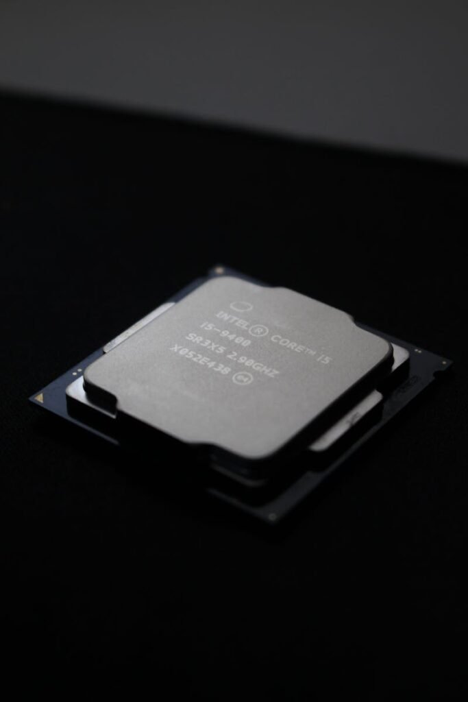 Detailed close-up image of a computer processor chip on a dark background.