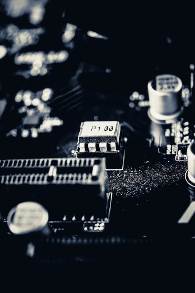 Detailed macro shot of a modern computer motherboard showcasing components and circuits.